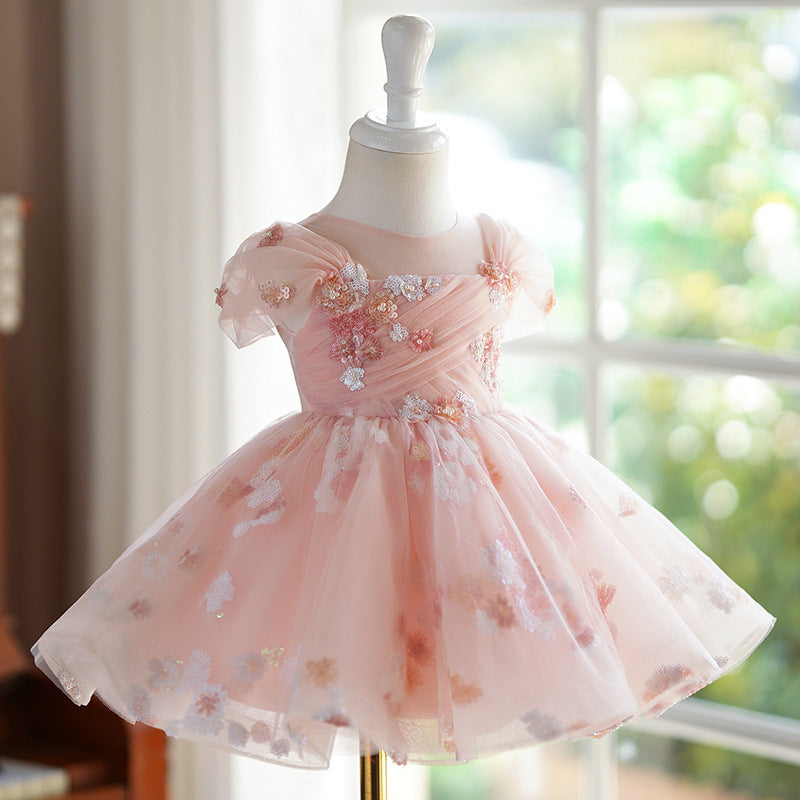 Abito da cerimonia per bambine visto da davanti e da dietro. Vestibilità comoda e design sofisticato per eventi speciali