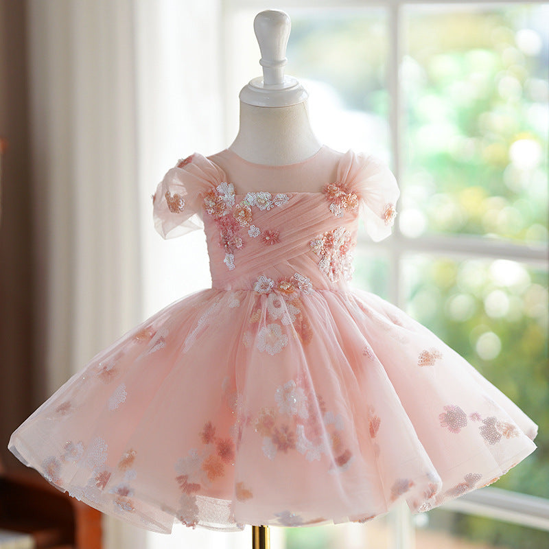 Abito da cerimonia per bambine visto da davanti e da dietro. Vestibilità comoda e design sofisticato per eventi speciali.