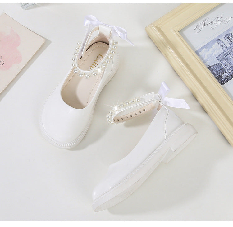 PEARL STRAP PATENT SHOES – CLASSIC CHARM WITH A TWIST