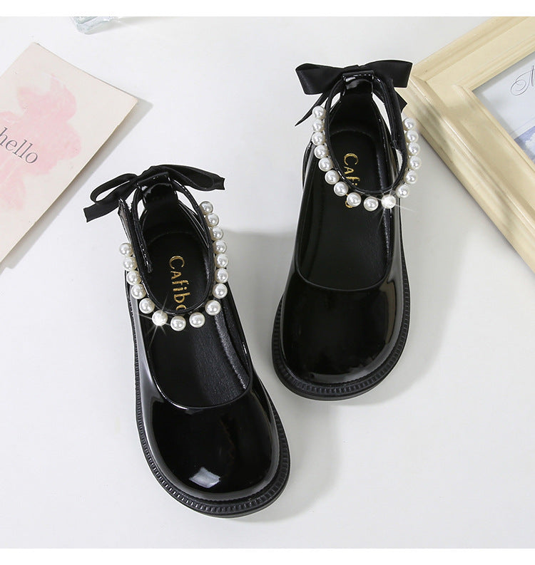 PEARL STRAP PATENT SHOES – CLASSIC CHARM WITH A TWIST