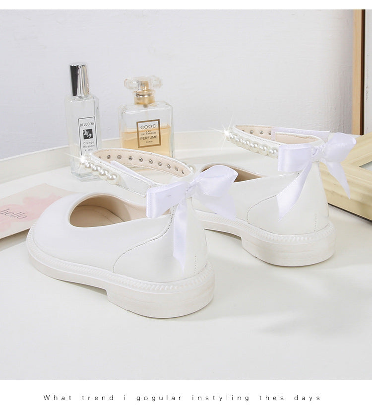 PEARL STRAP PATENT SHOES – CLASSIC CHARM WITH A TWIST