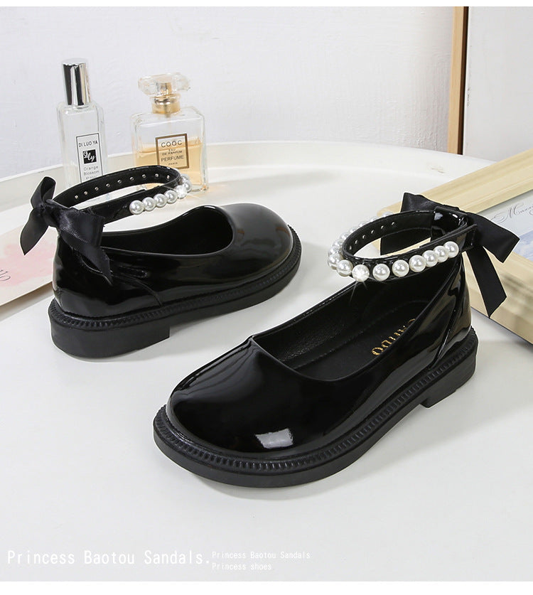 PEARL STRAP PATENT SHOES – CLASSIC CHARM WITH A TWIST