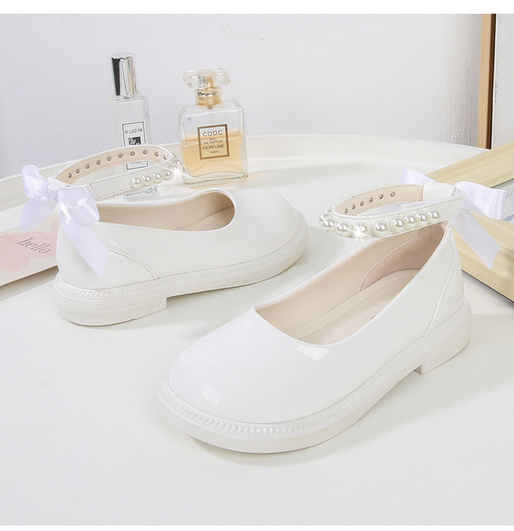 PEARL STRAP PATENT SHOES – CLASSIC CHARM WITH A TWIST