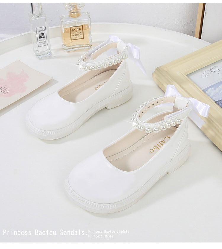 PEARL STRAP PATENT SHOES – CLASSIC CHARM WITH A TWIST