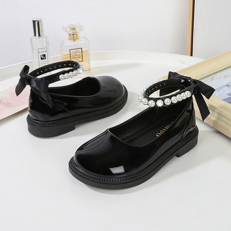 PEARL STRAP PATENT SHOES – CLASSIC CHARM WITH A TWIST