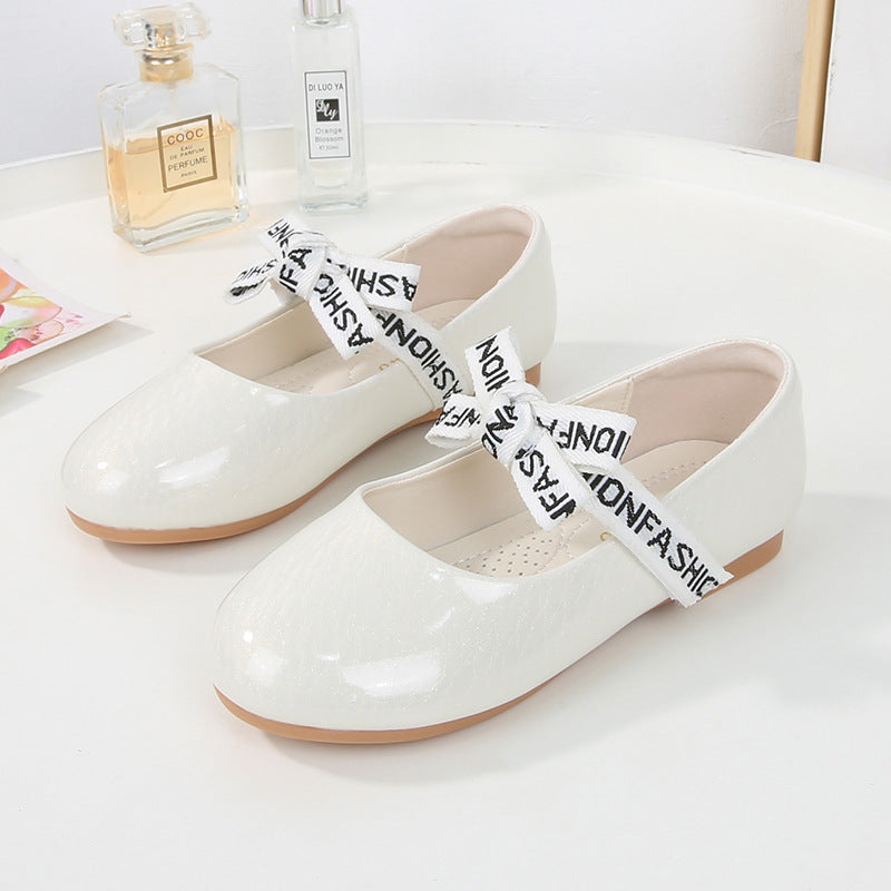 GLOSSY PRINCESS SHOES – SHINE WITH PATENT ELEGANCE
