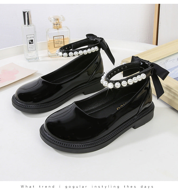 PEARL STRAP PATENT SHOES – CLASSIC CHARM WITH A TWIST